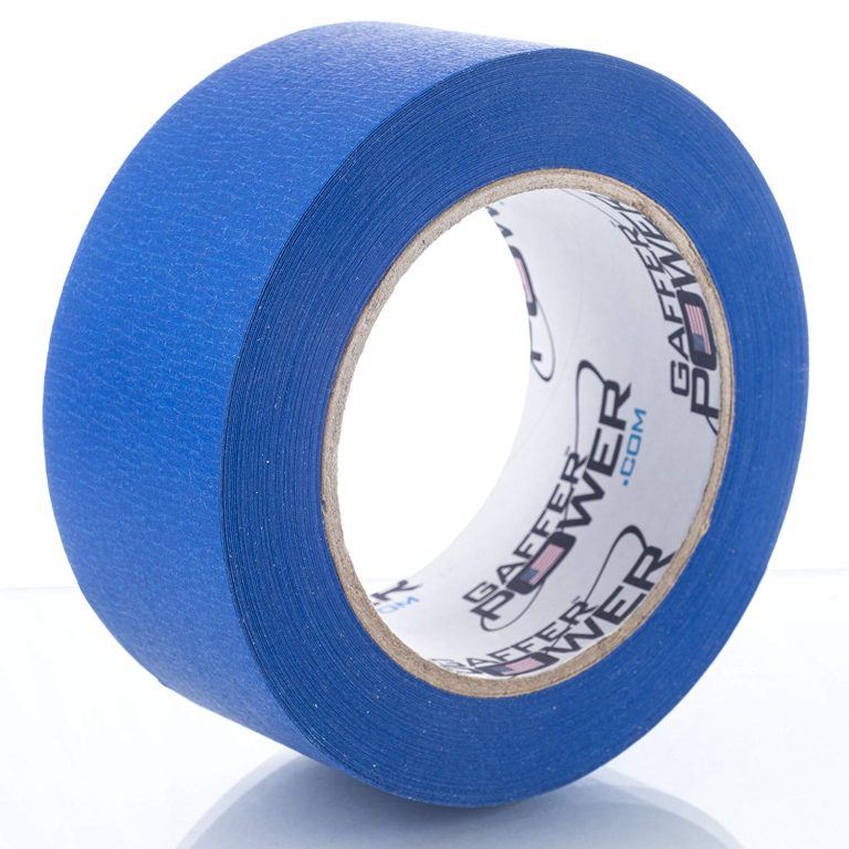 blue roll of Gaffer Power painter's tape upright on its side with a white background